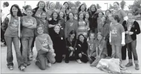  ?? COURTESY PHOTOS ?? The Lincoln chapter of Girls on the Run met Molly Barker, founder of the program, in April when she was the featured speaker at an event at Arvest Ballpark, at Springdale.