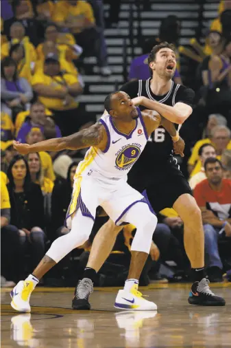  ?? Santiago Mejia / The Chronicle ?? Warriors swingman Andre Iguodala, defending against San Antonio center Pau Gasol in the second quarter of Game 1 of their playoff series, was a surprise starter Saturday.