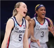  ?? GETTY IMAGES ?? HOW SWEET IT IS: UConn’s Paige Bueckers reacts against Syracuse during the second half of their second-round game of the NCAA Women’s Tournament at the Alamodome on Tuesday night in San Antonio.