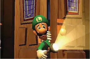  ??  ?? STAY SAFE: The torchlight is one of Luigi’s many “weapons.”