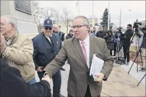  ?? Will Waldron / Times Union ?? Cohoes Mayor Shawn Morse, center, faces a seven-count felony indictment in federal court that includes charges of wire fraud and lying to FBI agents.
