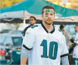  ?? JOJO WHILDEN/AP ?? Bradley Cooper dons a DeSean Jackson jersey in “Silver Linings Playbook,” a movie that hinges on the outcome of a game between the Eagles and Cowboys.