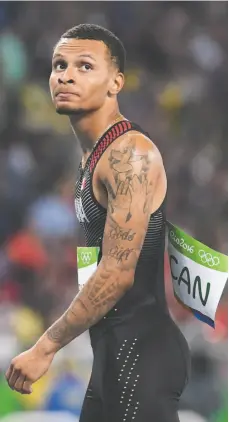  ?? CP FILE PHOTO ?? Canada’s Andre De Grasse reacts following the men’s 4x100metre relay final at the 2016 Summer Olympics in Rio de Janeiro on Aug. 19.