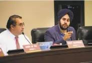  ?? Andy Alfaro / Modesto Bee ?? Mani Grewal (right), a candidate for state Senate, is under fire by the LGBT group Equality California.