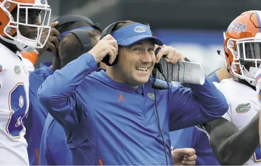  ?? Mark Humphrey/Associated Press ?? Dan Mullen is in his first year as head coach at Florida, where he was 3-1 against Georgia as offensive coordinato­r from 2005-08.