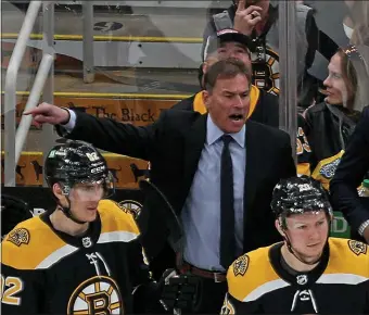  ?? STUART CAHILL / HERALD STAFF FILE ?? STATE OF THE TEAM: Bruins head coach Bruce Cassidy screams at the ref where he thinks the faceoff should be after a matching penalty call as the Bruins take on the Rangers on April 23 at TD Garden.