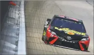  ?? Jared C. Tilton / Getty Images ?? Martin Truex Jr. takes a practice run at Chicagolan­d Speedway on Saturday.