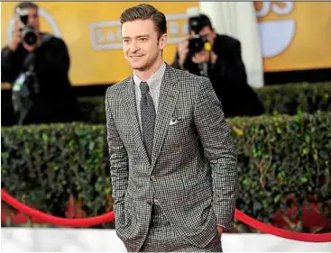  ??  ?? For the 19th annual Screen actors Guild awards, Timberlake wore a suit by Tom Ford.