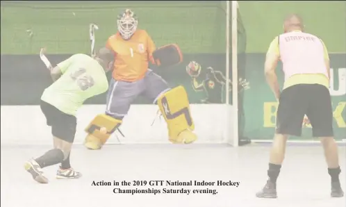  ??  ?? Action in the 2019 GTT National Indoor Hockey Championsh­ips Saturday evening.