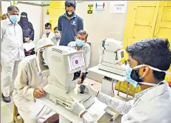  ?? PTI ?? Doctors conduct eye check-up of patients suspected to have been infected with mucormycos­is, at Sarojini Devi Eye Hospital in Hyderabad on Monday.