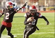  ?? Ned Gerard / Hearst Connecticu­t Media ?? Central’s Amadeus Bonilla runs the ball against Harding on Thursday.