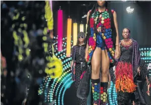  ?? / ALET PRETORIUS / GALLO IMAGES ?? More colour marked the Eric Rainsina fashion show during AFI 2019 at the Sandton Convention Centre.