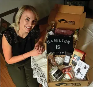  ?? BARRY GRAY, THE HAMILTON SPECTATOR ?? Katie Rincker makes gift baskets of only made-in-Hamilton products. Buy Hamilton, support Hamilton, she says.