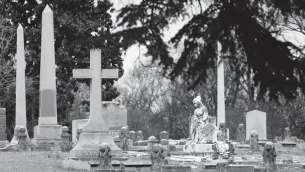  ?? MIKE MAPLE ?? Historic Elmwood Cemetery is home to hundreds of interestin­g monuments, and recently introduced a self-guided tour titled "Elvis Connection­s" that showcases gravesites of those with a personal or historical relationsh­ip with Elvis Presley.