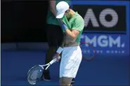  ?? MARK BAKER — THE ASSOCIATED PRESS FILE ?? Defending men’s champion Serbia’s Novak Djokovic practices on Margaret Court Arena ahead of the Australian Open tennis championsh­ip in Melbourne, Australia, on Jan. 13, 2022. Tennis star Djokovic faces deportatio­n again after the Australian government revoked his visa for a second time. Immigratio­n Minister Alex Hawke said Friday, Jan. 14, he used his ministeria­l discretion to revoke the 34-year-old Serb’s visa on public interest grounds three days before the Australian Open is to begin.