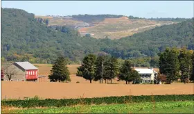  ?? READING EAGLE ?? Host fees paid by the Rolling Hills Landfill, seen in the background, enables Earl Township to forgo a property tax on its residents.