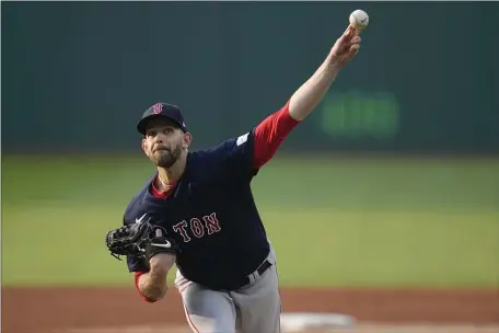  ?? SUE OGROCKI — THE ASSOCIATED PRESS ?? Boston Red Sox starting pitcher James Paxton throws during the first inning Tuesday night against Cleveland. The Red Sox earned a 5-4 road victory.