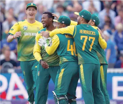  ?? — Reuters ?? South Africa players celebrate their win against England during the second T20 at Taunton.