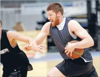  ?? Photo: DOUG FIELD/FAIRFAX NZ ?? Fired up: Sharks import Brian Conklin gets stuck in at training last night.