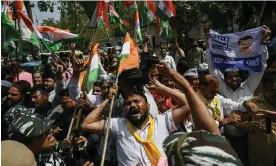  ?? Photograph: Arun Sankar/AFP/Getty Images ?? Aam Aadmi party activists protest in New Delhi after party head and Delhi chief minister Arvind Kejriwal was arrested. India has summoned US envoy Gloria Berbena over Washington’s comments on the case.