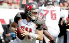  ?? Associated Press ?? Ryan Fitzpatric­k had a brief run of brilliance last season with Tampa Bay that came to be known as “Fitzmagic.”