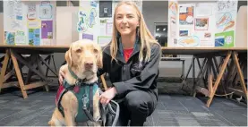  ?? Photo / NZME ?? Te Arawa Lakes Trust environmen­tal officer Keeley Grantham with pest fish detecting dog Aspen. Using scent-detection dogs for aquatic species is a new approach that Dr Clare Browne will discuss.