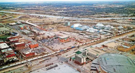  ?? [PHOTO BY DOUG HOKE, THE OKLAHOMAN ARCHIVES] ?? In this 2015 photo, 32 buildings, most covered in sheet metal, stand at the cotton mill, which have been on the site since territoria­l days.