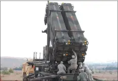  ??  ?? File photo shows US soldiers working on a Patriot missile system at a Turkish military base in Gaziantep.