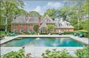  ?? Contribute­d by Houlihan Lawrence ?? The owners added the 50-foot inground pool to the 4-acre property, embraced by hydrangea gardens.