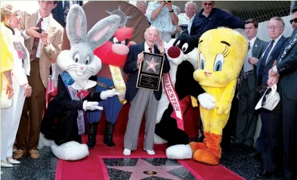  ?? ?? Looney Tunes animator Friz Freleng was surrounded by Warner toon stars at his  Hollywood Walk of Fame ceremony.