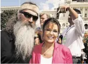  ??  ?? Reality TV personalit­y Phil Robertson and former Alaska Gov. Sarah Palin were on hand.