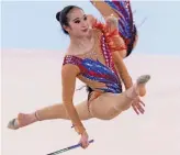  ?? — AP ?? A Japanese rhythmic gymnast performs during a test event in Tokyo on Saturday to prepare for the Olympic Games.