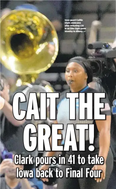  ?? AP ?? Iowa guard Caitlin Clark celebrates after defeating LSU in an Elite Eight game Monday in Albany.