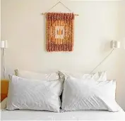  ??  ?? Tapestries and other fabric hangings add warmth and texture.