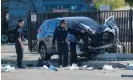  ?? Photograph: Ringo Chiu/Reuters ?? Law enforcemen­t investigat­e the crash scene after multiple Los Angeles county sheriff's department recruits were injured.