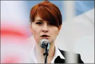  ?? AP file photo ?? Maria Butina speaks during a 2013 rally in Moscow as an advocate for legalizing handgun possession. The Justice Department says the Russian gun-rights activist infiltrate­d U.S. political organizati­ons including the National Rifle Associatio­n.