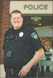  ?? BEA AHBECK/ NEWS-SENTINEL ?? Lodi police officer Ryan Holz pictured in Lodi on Tuesday. Holz was named Lodi’s employee of the year for his efforts to help Lodi’s residents, with special focus on the city’s senior and homeless population­s.