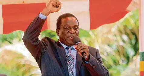  ?? Foto: Tsvangiray­i Mukwazhi, dpa ?? „Krokodil“heißt sein Spitzname: Emmerson Mnangagwa will Präsident von Simbabwe werden.