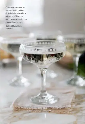  ??  ?? Champagne coupes etched with polkadot details introduce a touch of history and decoration to the clean-lined room.
GLASSES, Williams Sonoma.