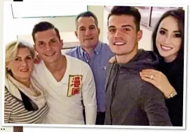  ?? ?? FAMILY MAN: Xhaka (second right) with his parents Elmaze and Ragip, brother Taulant and wife Leonita