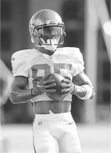  ?? CHRIS O'MEARA/AP ?? Buccaneers receiver Jaydon Mickens catches the ball during a training camp workout.