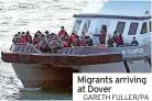  ?? GARETH FULLER/PA ?? Migrants arriving at Dover