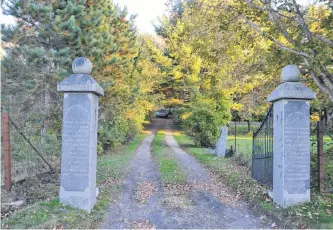  ?? LAWRENCE POWELL/SALTWIRE NETWORK ?? The entrance to the Round Hill Graveyard is framed by two big granite posts. Once you’re inside, you’ll be led on a walk among the graves and back through time to when the English settled the area in the 1700s.