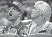  ?? AP ?? Mike Perry and Danielle Nickerson at an Orlando Magic game in February 2018.