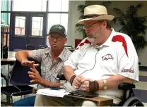  ?? Staff photo by Jim Williamson ?? Chas Davis, left, talks to Little River County Judge Mike Cranford about the Red River flooding after a meeting Monday. Littler River County has been declared a disaster and is now eligible for state and federal funds.