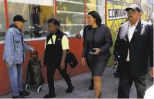  ?? Yalonda M. James / The Chronicle 2018 ?? Public Works Director Mohammed Nuru (right) participat­es in a walking tour of the Tenderloin with Mayor London Breed.