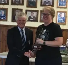  ??  ?? Wexford Wanderers RFC Club Person of the Year award winner Bettie Marie Smit receives her award from club President Brian McGonigal.