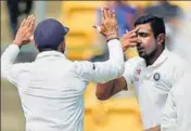  ?? BCCI ?? Ravichandr­an Ashwin pointed his finger toward his forehead after getting Mitchell Starc out in Bangalore Test.
