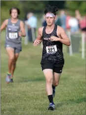  ?? NWA Democrat-Gazette photograph by Andy Shupe ?? Pea Ridge’s Elijah Wiggins (321) competed Saturday, Sept. 19, in the high school boys race of the Siloam Springs Panther Cross Country Classic at the Simmons Course in Siloam Springs. Wiggins came in with a time of 19:18.07 in the 5,000-meter.