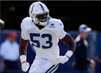  ?? AP Photo/Michael Conroy ?? In this 2019 file photo, Indianapol­is Colts outside linebacker Darius Leonard (53) runs a drill during practice at the NFL team’s football training camp in Westfield, Ind.